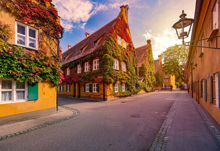 photo of view of The Fuggerei is the world's oldest social housing complex still in use. It is a walled enclave within the city of Augsburg, Bavaria, Germany