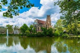 Photo of aerial panoramic view of Hohes Schloss Fussen or Gothic High Castle of the Bishops and St. Mang Abbey monastery in Fussen, Germany.