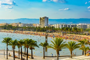 Photo of aerial view of beach and cityscape Salou, Spain.