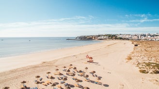 Photo of panoramic aerial view of Praia da Luz in municipality of Luz in Algarve, Portugal.