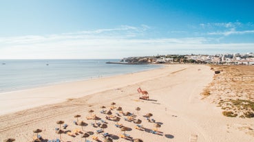 Photo of panoramic aerial view of Praia da Luz in municipality of Luz in Algarve, Portugal.