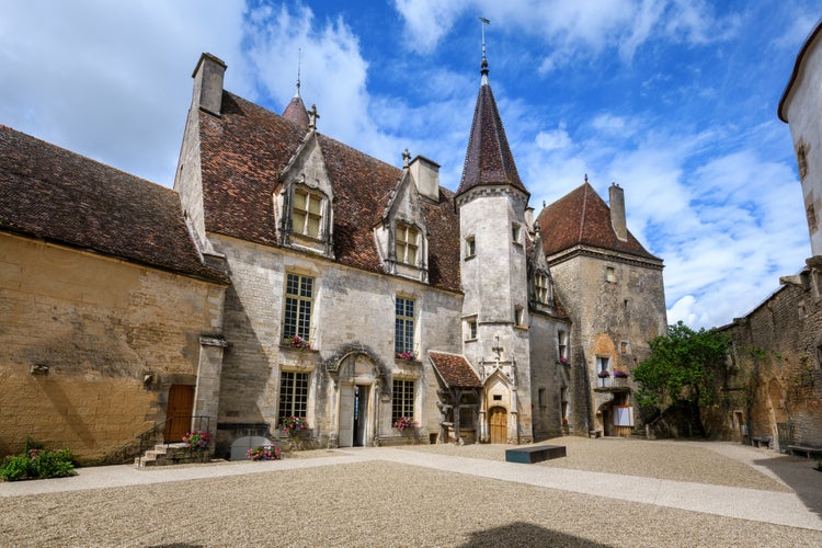 Photo of The medieval castle in Chateauneuf-en-Auxois village, Burgundy, France. Chateauneuf-en-Auxois is one of the most beautiful villages in France.