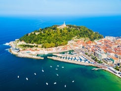 Photo of panoramic aerial view of San Sebastian (Donostia) on a beautiful summer day, Spain.