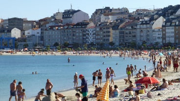 Photo of aerial view of an empty beach in Portonovo in the Ria de Pontevedra, Spain.