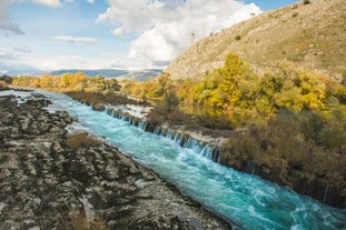 Photo of aerial view of the old bridge and river in city of Mostar, Bosnia and Herzegovina.