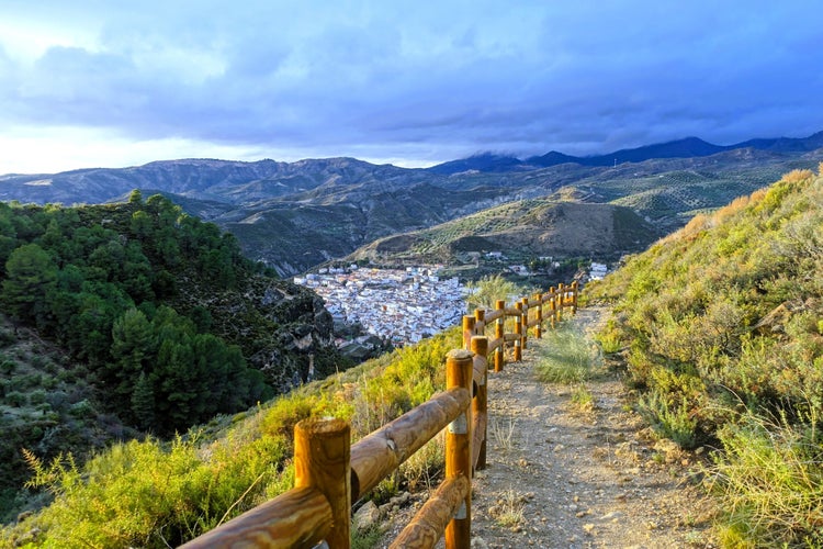 Horizontal shot of a hiking trail overlooking Quéntar, a traditional white village in the Sierra Nevada mountains near Granada.jpg