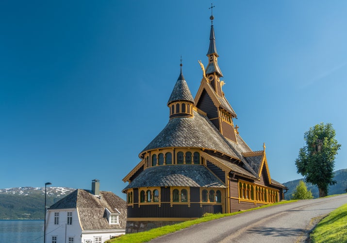 photo of view of The church of Balestrand Sogndal, Vestland, Norway. On the northern shore of the Sognefjorden. A major tourist stop since the 1800s.