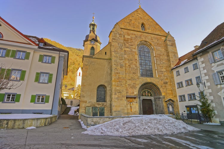 St Maria Himmelfahrt in Chur at sunrise in winter. Chur is the capital of canton Graubunden in Switzerland. It lies in the Alpine Grisonian Rhine valley. The city is the oldest town of Switzerland