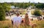 photo of people in park blurry in crowded Park (Mauerpark) on a sunny summer Sunday in Berlin, Germany.