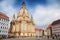 Photo of famous church of Our Lady during the sunrise in Dresden city, Germany.