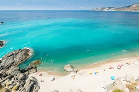 Photo of aerial view of the town of Nerja with the beautiful beach, Málaga, one of the white villages of Andalusia, Spain.