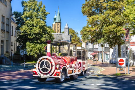 Photo of small sightseeing train in Goslar on a sunny Day, Germany.