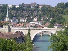 Bern, Switzerland. View of the old city center and Nydeggbrucke bridge over river Aare.