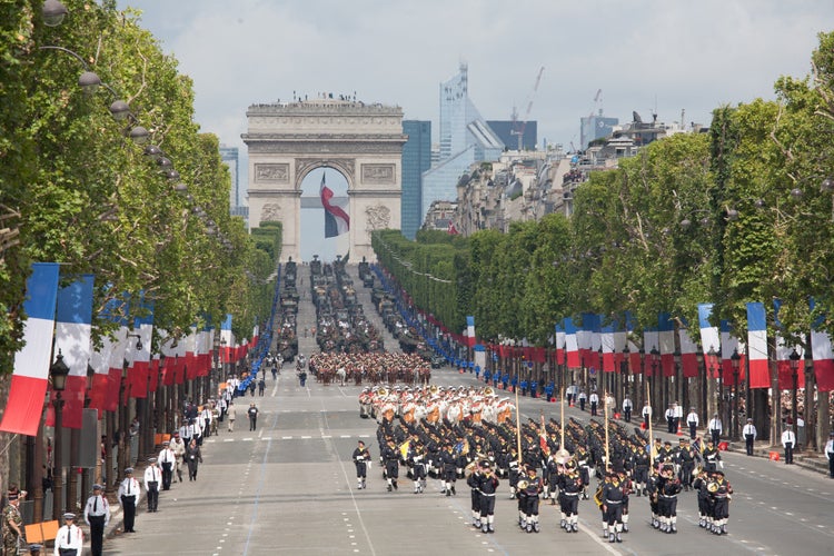 Soldiers from the French Foreign Legion march during the annual military parade in honor of the Bastille Day.jpg