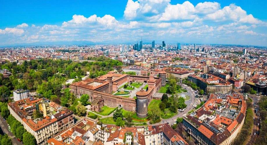 Photo of Sforza Castle or Castello Sforzesco aerial panoramic view. Sforza Castle is located in Milan city in northern Italy.