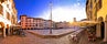 Piazza San Giacomo in Udine sunset panoramic view, town in Friuli Venezia Giulia region of Italy.