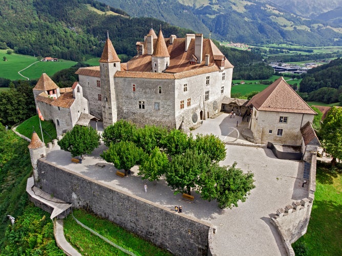 photo of view of Aerial view of the medieval Gruyere castle, Canton of Fribourg, Switzerland.