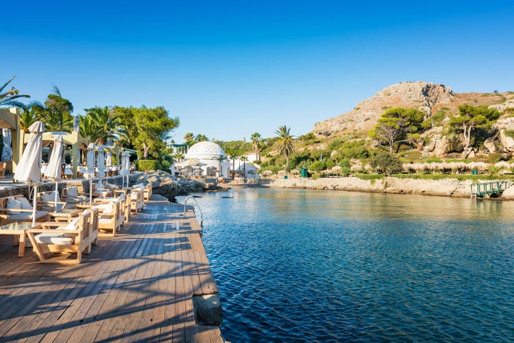 Photo of scenic view of Kalithea bay with white Dome ,Rhodes, Greece.