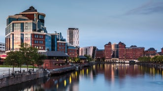 Aerial drone view of Manchester city in UK on a beautiful sunny day.