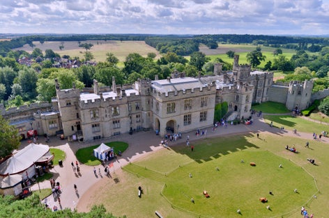 Photo of aerial viewof Warwick castle a historic building in the heart of Warwickshire, England UK.