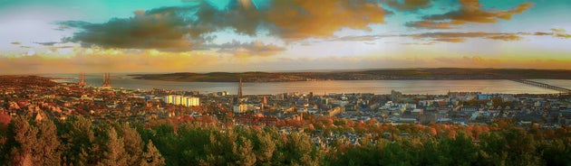 Photo of beautiful view of the old town city of Edinburgh from Calton Hill, United Kingdom.