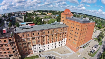 Photo of aerial view of Torun old town with Vistula river, Poland.