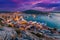 photo of night view of Cesme Marina, from Cesme Castle. Cesme is a coastal town in Izmir, Turkey.