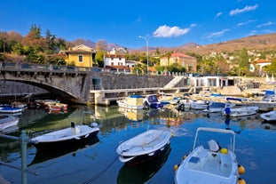 Photo of Ika village waterfront in Opatija riviera, turquoise sea and blue sky, Kvarner, Croatia.