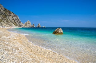 photo of majestic sunrise in Numana public beach. Picturesque summer seascape of Adriatic Sea. Colorful outdoor scene of Italy, Europe.