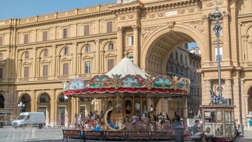 Famous buildings, gondolas and monuments by the Rialto Bridge of Venice on the Grand Canal, Italy.