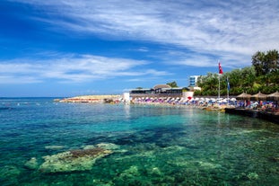 Photo of aerial view of Kuşadası beach resort town on Turkey’s western Aegean coast.