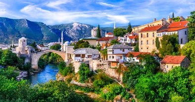 Photo of aerial view of the old bridge and river in city of Mostar, Bosnia and Herzegovina.