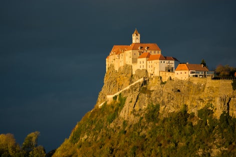 Photo of Castle Riegersburg in Austria at Sunset.