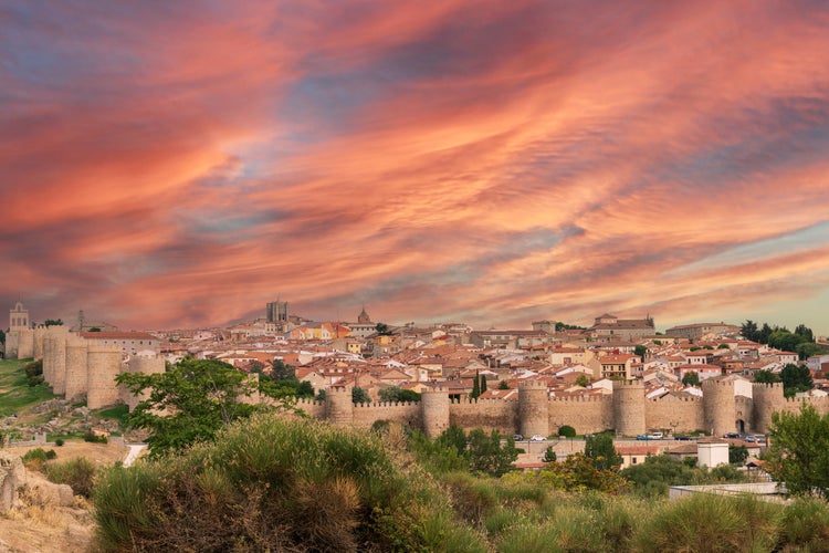 photo of view of panoramic view of the city of Avila at sunset, Spain.