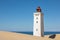 Photo of Rubjerg Knude Fyr, lighthouse on the dune near Lønstrup, Denmark.