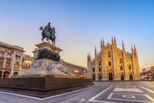 Photo of beautiful view of canal with statues on square Prato della Valle and Basilica Santa Giustina in Padova (Padua), Veneto, Italy.