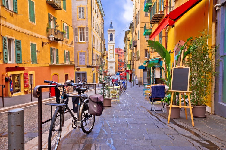 Photo of Nice colorful street architecture and church view, tourist destination of French riviera.