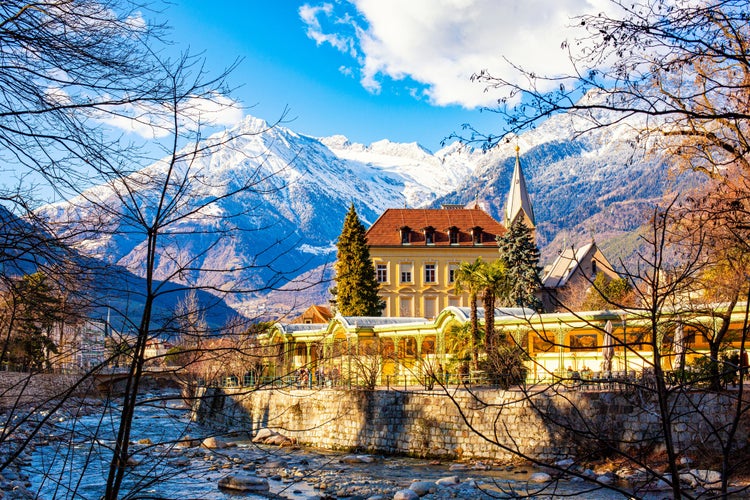 MERANO,ITALY -  Merano o Meran is a city and comune in South Tyrol, northern Italy. Generally best known for its spa resorts. Passer River, Alps mountains in winter time.