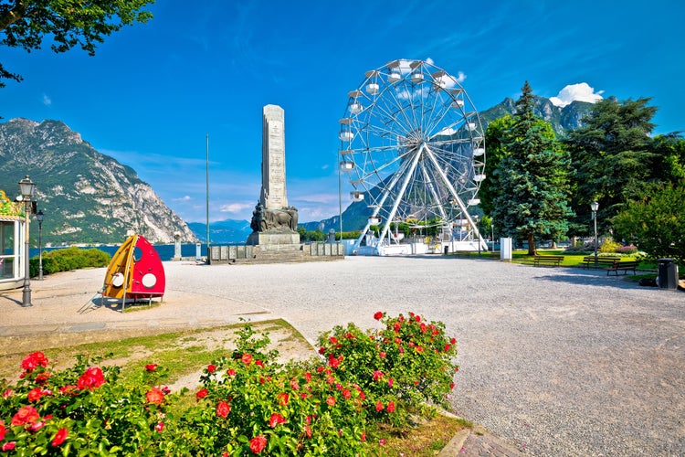 Town of Lecco on Como Lake waterfront and ferris wheel view, Lombardy region of Italy