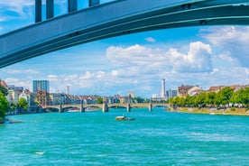 View of the Old Town of Basel with red stone Munster cathedral and the Rhine river, Switzerland.