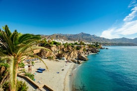 Photo of aerial view of beach in Nerja, Malaga province, Costa del Sol, Andalusia, Spain.