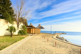 photo of aerial panoramic view of beautiful town of Lovran and sea walkway in Croatia.