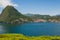 photo of Lake Lugano and Mount San Salvatore on a sunny summer day. Alpine mountain scenery in the city of Lugano, Switzerland.