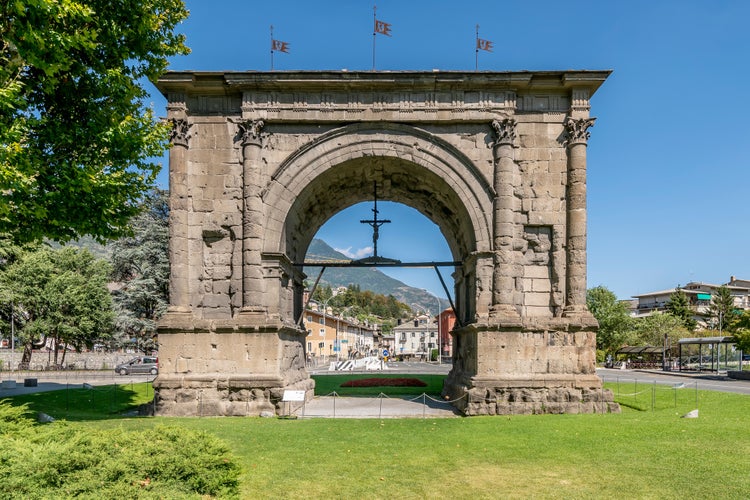 The ancient Arch of Augustus in the historic center of Aosta, Italy, on a sunny day