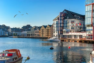 Photo of aerial view of the city of Alesund , Norway.