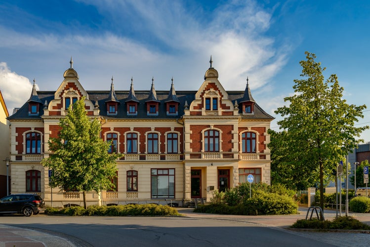 Photo of representative bourgeois architecture: Listed duplex house in Waren/ Müritz in evening light, Germany.