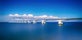 photo of a beautiful morning at Zeeland Bridge a long bridge over the blue sea in Zierikzee, the Netherlands.