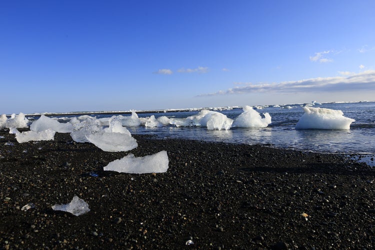 photo of view of View of a glacier on the diamond beach in the south of the Vatnajökull glacier between Vatnajökull National Park and the town of Höfn, Iceland.