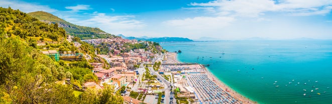 Aerial panoramic cityscape of Rome, Italy, Europe. Roma is the capital of Italy. Cityscape of Rome in summer. Rome roofs view with ancient architecture in Italy. 