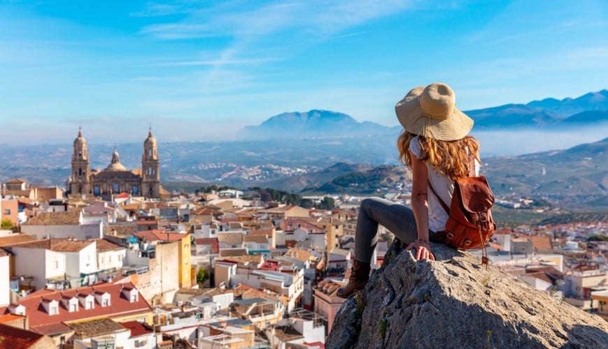 Woman tourist at Jaen, looking at panoramic view of the cathedral- Spain